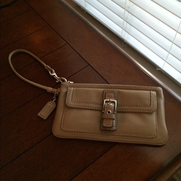 Authentic Coach wristlet.