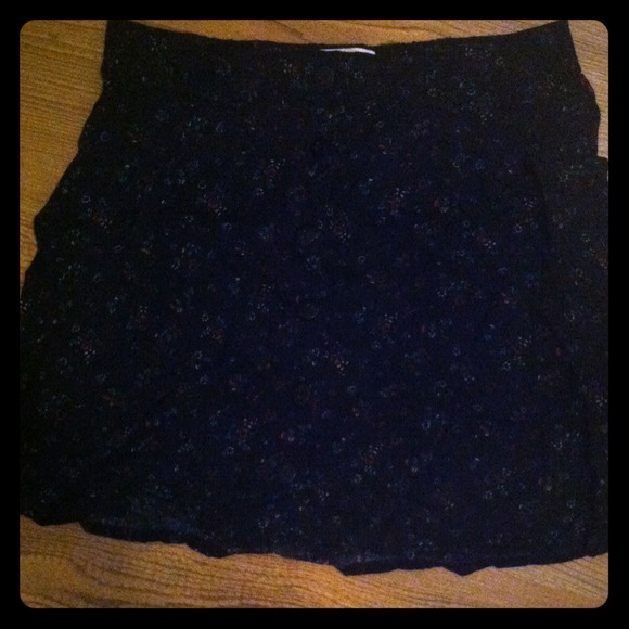 Navy blue skirt with flowers and buttons