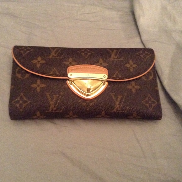 SOLD MINT LOUIS VUITTON EUGENIE WALLET IN MONO