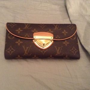 SOLD MINT LOUIS VUITTON EUGENIE WALLET IN MONO