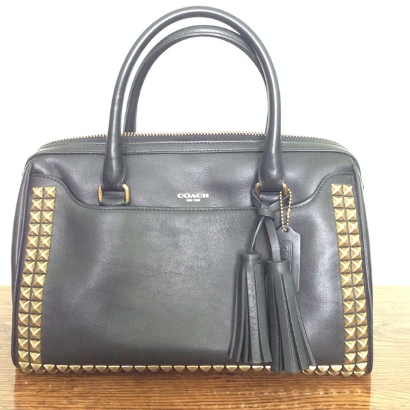 Studded coach tote.