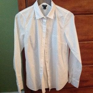 White with black dot button down woman's shirt