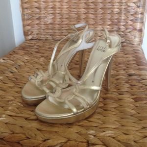 Brand new Stuart Weitzman strappy gold heal