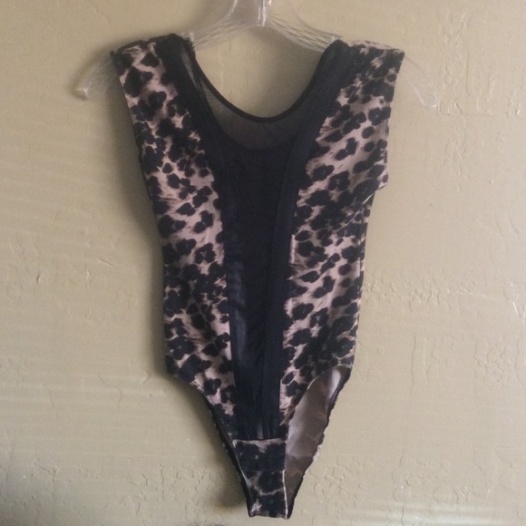 Cheetah print body suit.