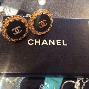 Chanel gold and black studs