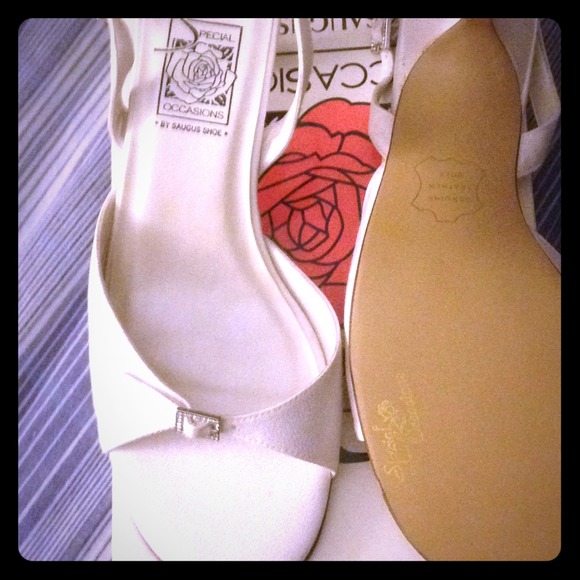 White dyable slingback kitten heels.