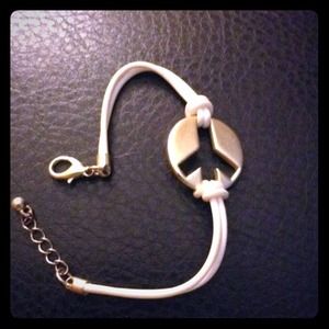 ** SOLD** Gold peace with white band