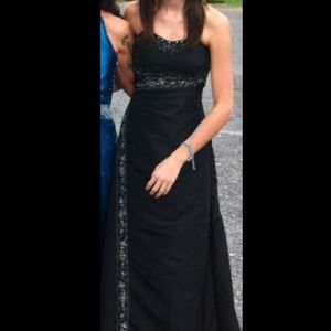 Beautiful black formal gown with beading detail!