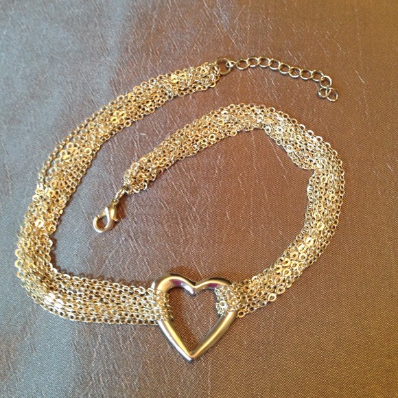 Silver,  multi-layered puffy heart necklace