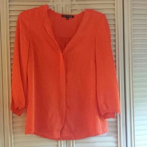 Orange button up blouse