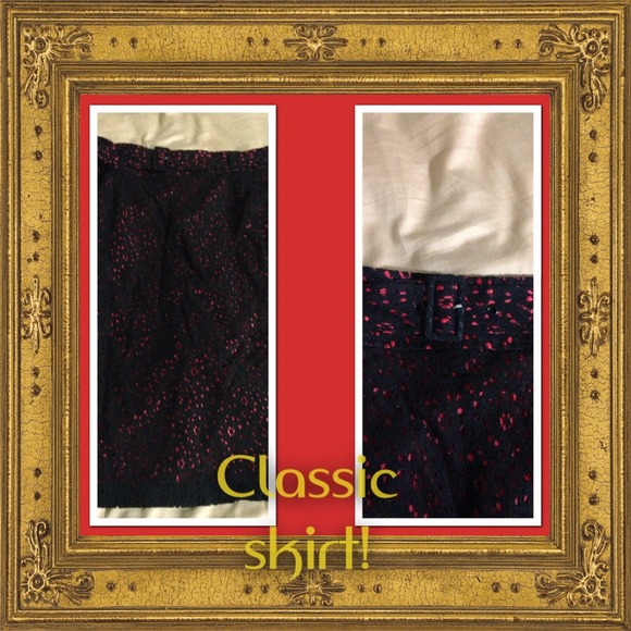 Knee length eyelet pencil skirt with red underlay.