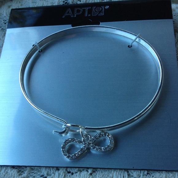 Silver bangle w/ infinity charm