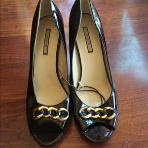 Black peep toe heels with gold chain