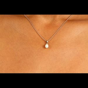 $100 Tahitian clear water pearl.