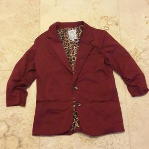 Maroon blazer with cheetah print inside
