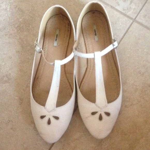 Urban Outfitters simple white Mary Jane flats.
