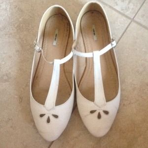 Urban Outfitters simple white Mary Jane flats.