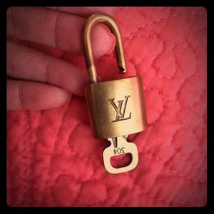 Authentic Louis Vuitton lock and key no. 304