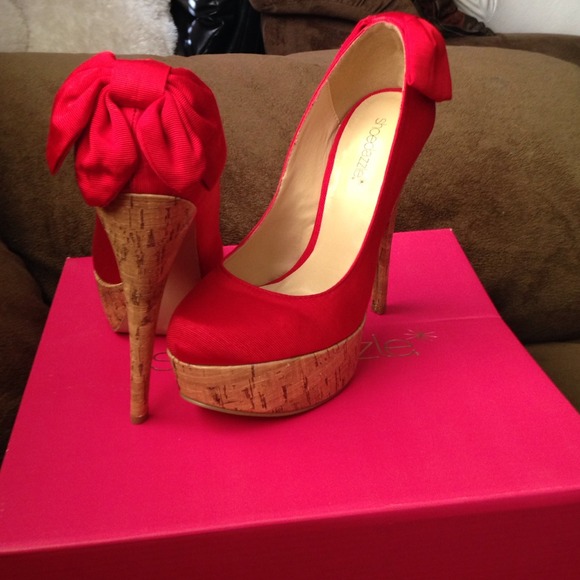 Red heel pumps