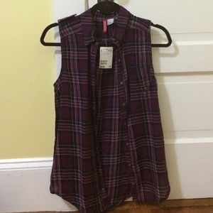 Purple plaid sleeveless vest.