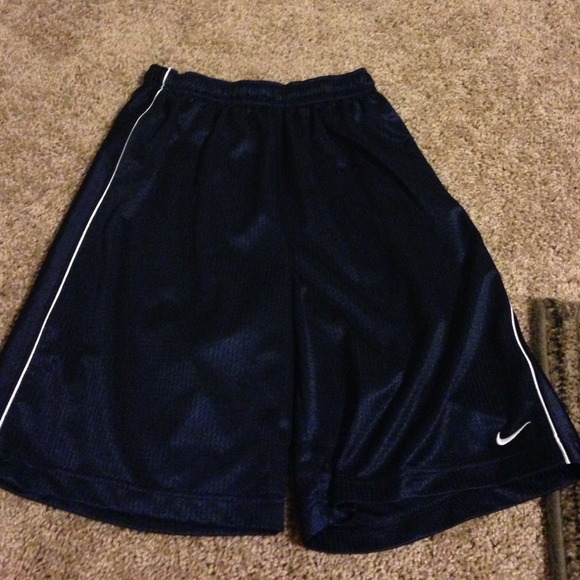 Navy blue and white basketball shorts.