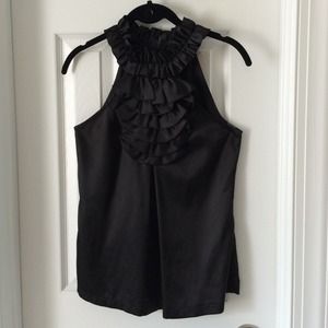 Black ruffle top. Perfect for work or a night out!