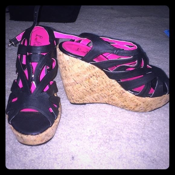 Brand new black wedge sandals size 8, never worn.