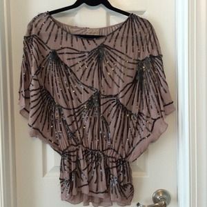 Reserved. Beautiful sequined flutter top from Saks