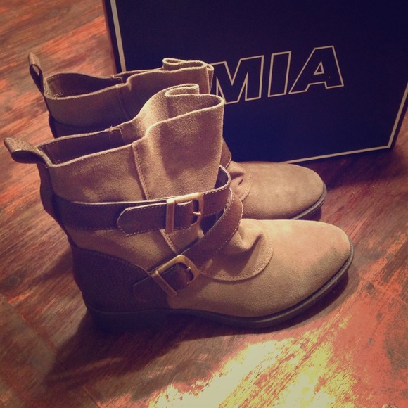 Brown buckle ankle boots