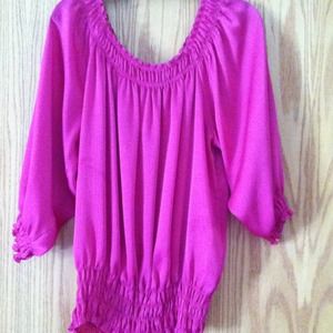 Fuschia blouse.
