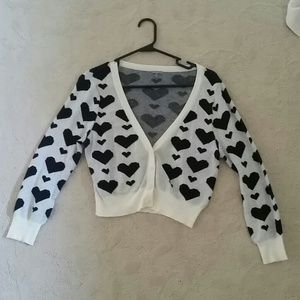 Long sleeve sweater that goes down to rib cage