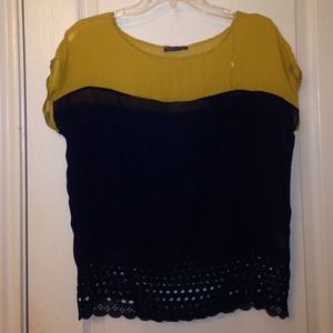 Chiffon loose top with cut out design bottom.