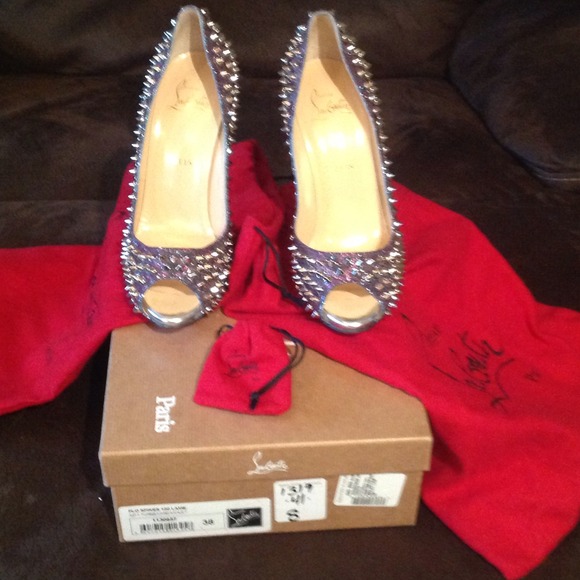 100% Authentic CL Spikes brand new from Saks