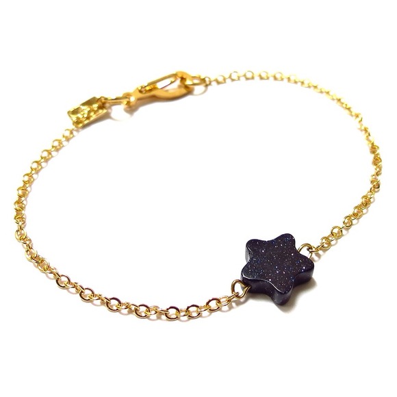 Goldstone star bracelet comes with pouch.