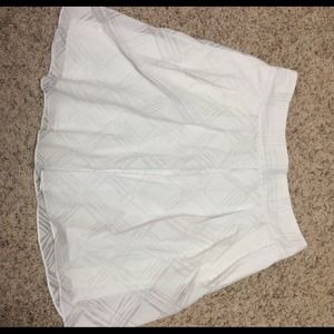 White skirt by Express Design Studio