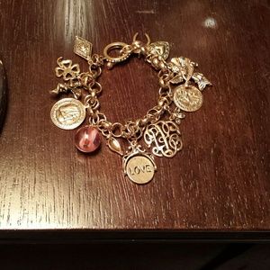 Gold tone charm bracelet