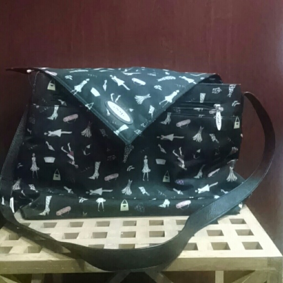 Nicole Miller Handbags - Sold in bundle NICOLE MILLER LAPTOP/BOOK CASE
