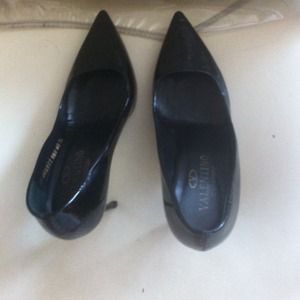 Patten leather pumps