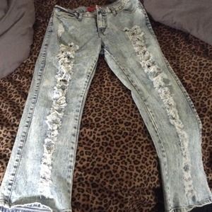 High waisted boyfriend cut ripped denim.
