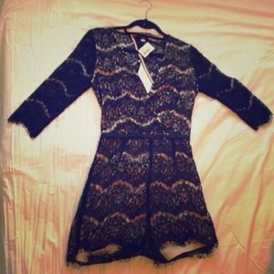 ANGL all over lace 3/4 sleeve romper (Medium)