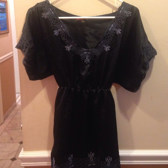 Never worn, beautiful black top.