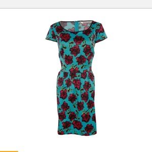 Kensie satin dress with faux leather trim.