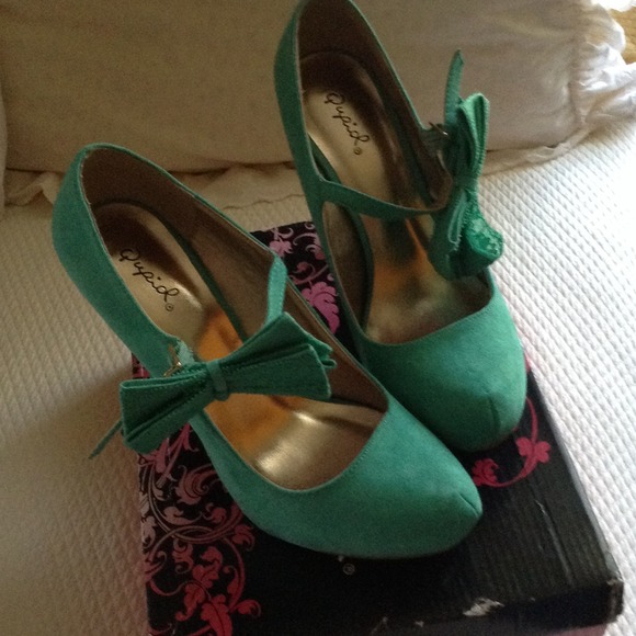 Sea green suede hills