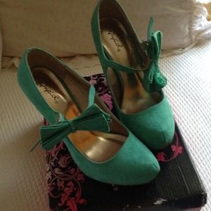 Sea green suede hills
