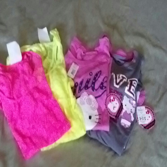 2 xl, HELLO KITTY and 2 lace tank. New.