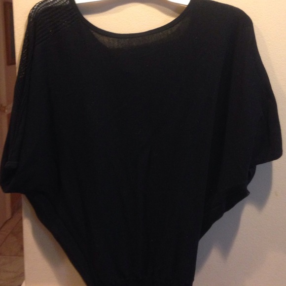Black t shirt with a mesh design on the back