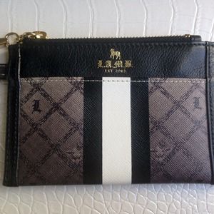 L.A.M.B Signature Black & White Striped Wristlet