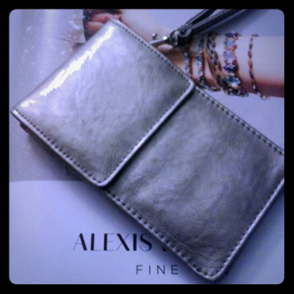 ~sold~ Patent wristlet