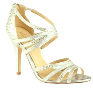 MUST SELL! ALDO silver heels size 6.5. Never worn!