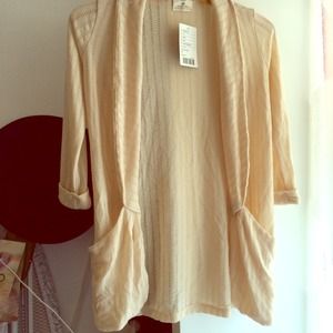 Beige cardigan with collar and pockets